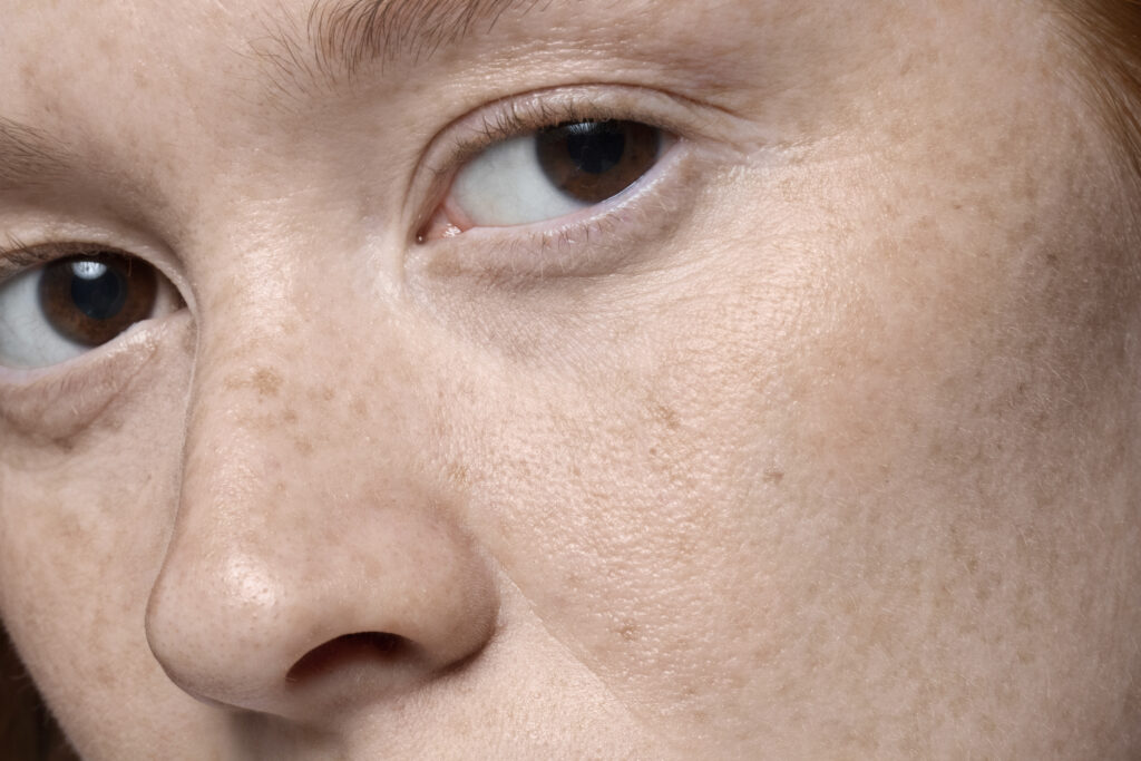 close up pores woman face