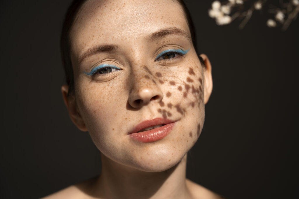 front view woman wearing makeup with thick eyebrows